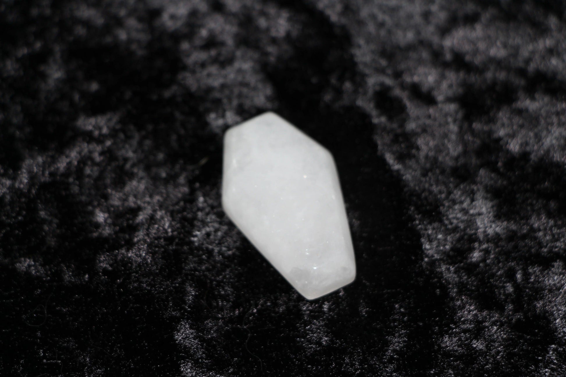 Clear quartz crystal on black velvet, modern witch ritual tool, Witches' Brew