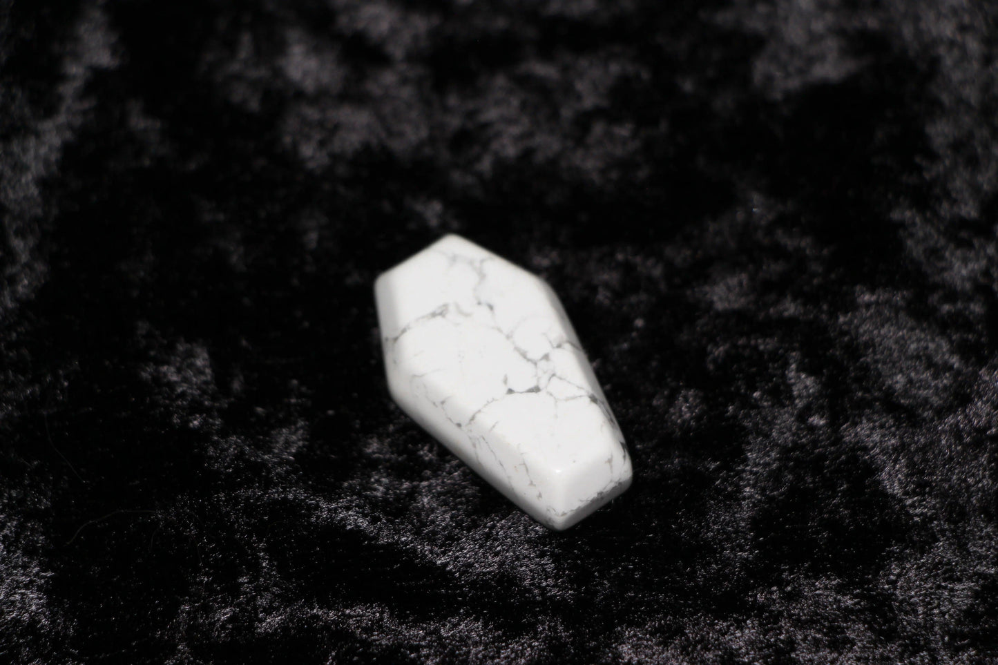 Howlite crystal coffin on black velvet, witchcraft ritual tool, Witches' Brew