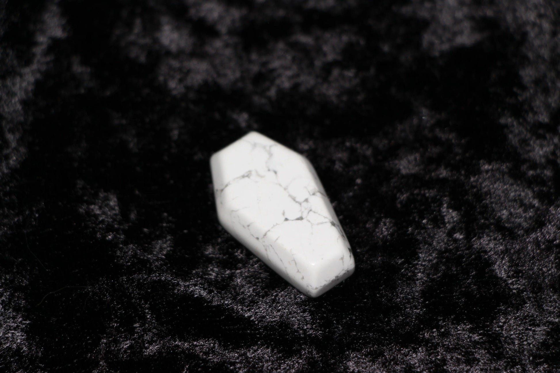 Howlite crystal coffin on black velvet, witchcraft ritual tool, Witches' Brew