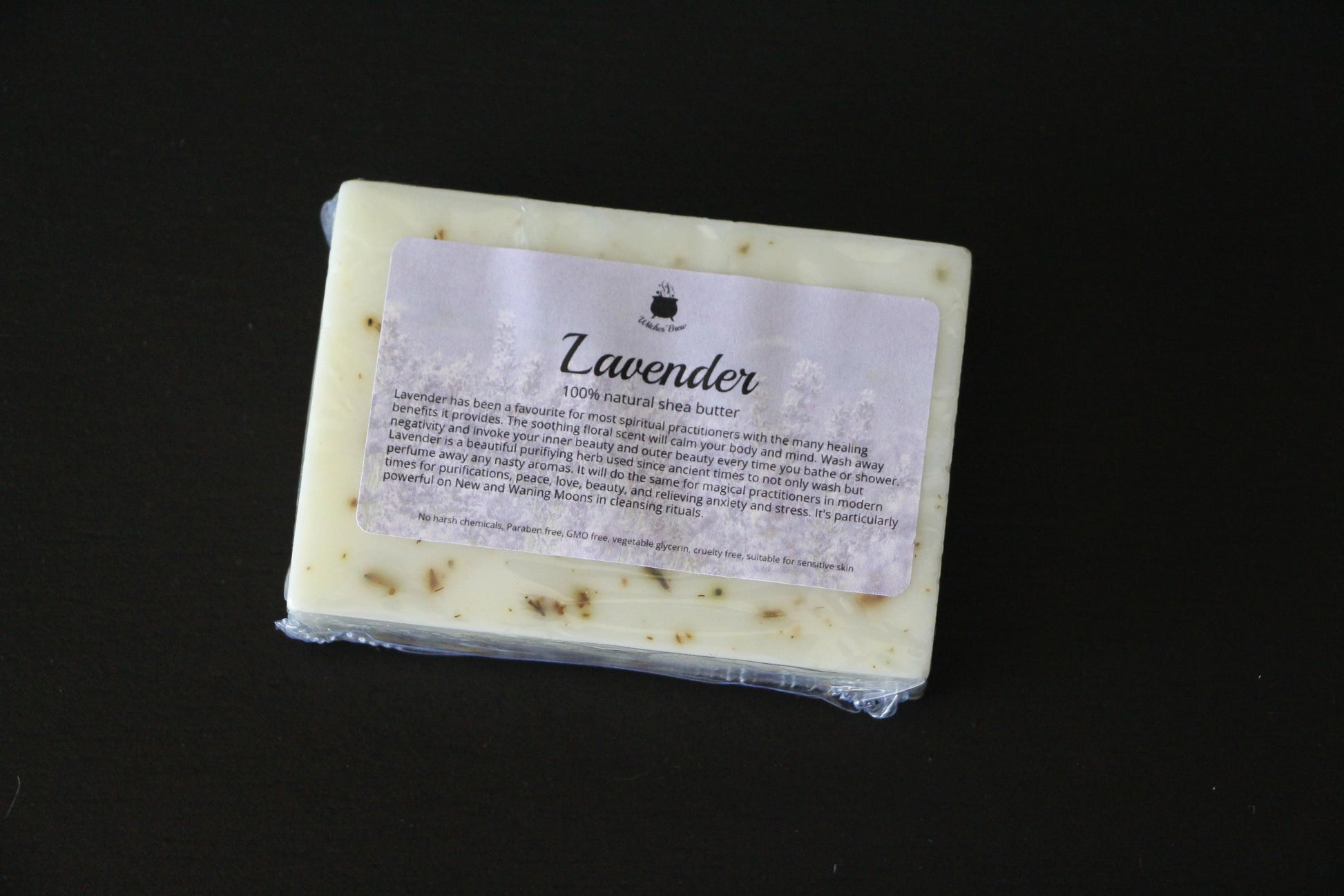Lavender 100% natural shea butter soap bar with healing floral scent on black background