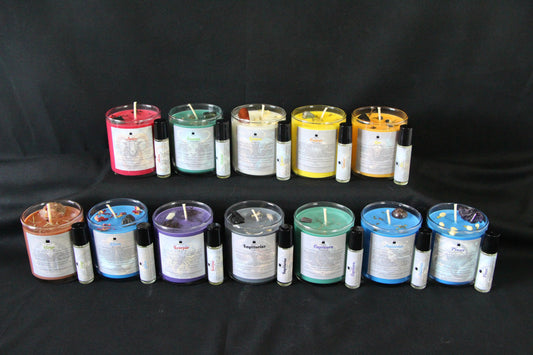 Zodiac crystal candles and essential oils on black background, Witches' Brew hand-crafted goods