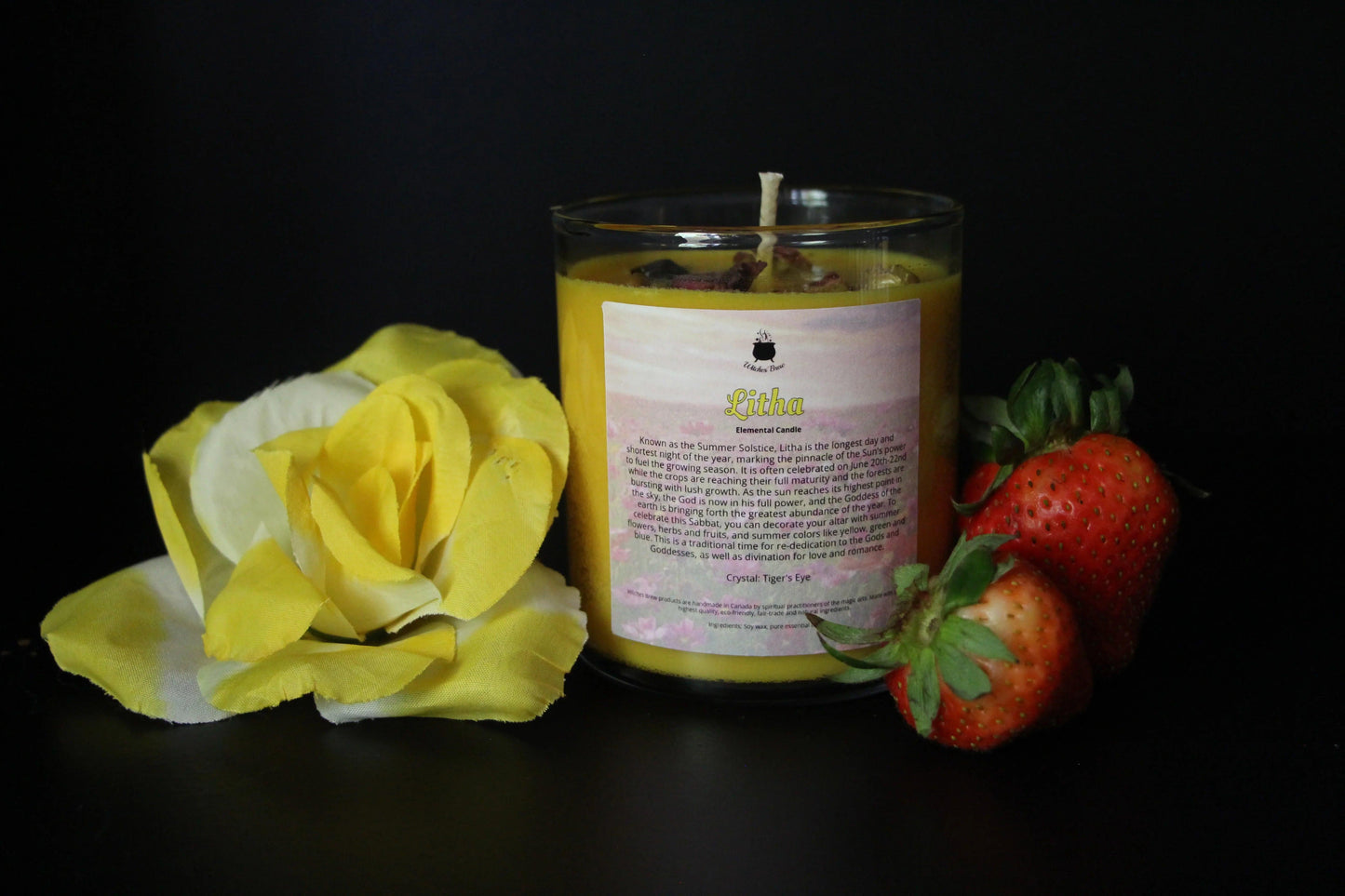 Litha crystal candle with yellow flower and strawberries, sustainable witchcraft decor