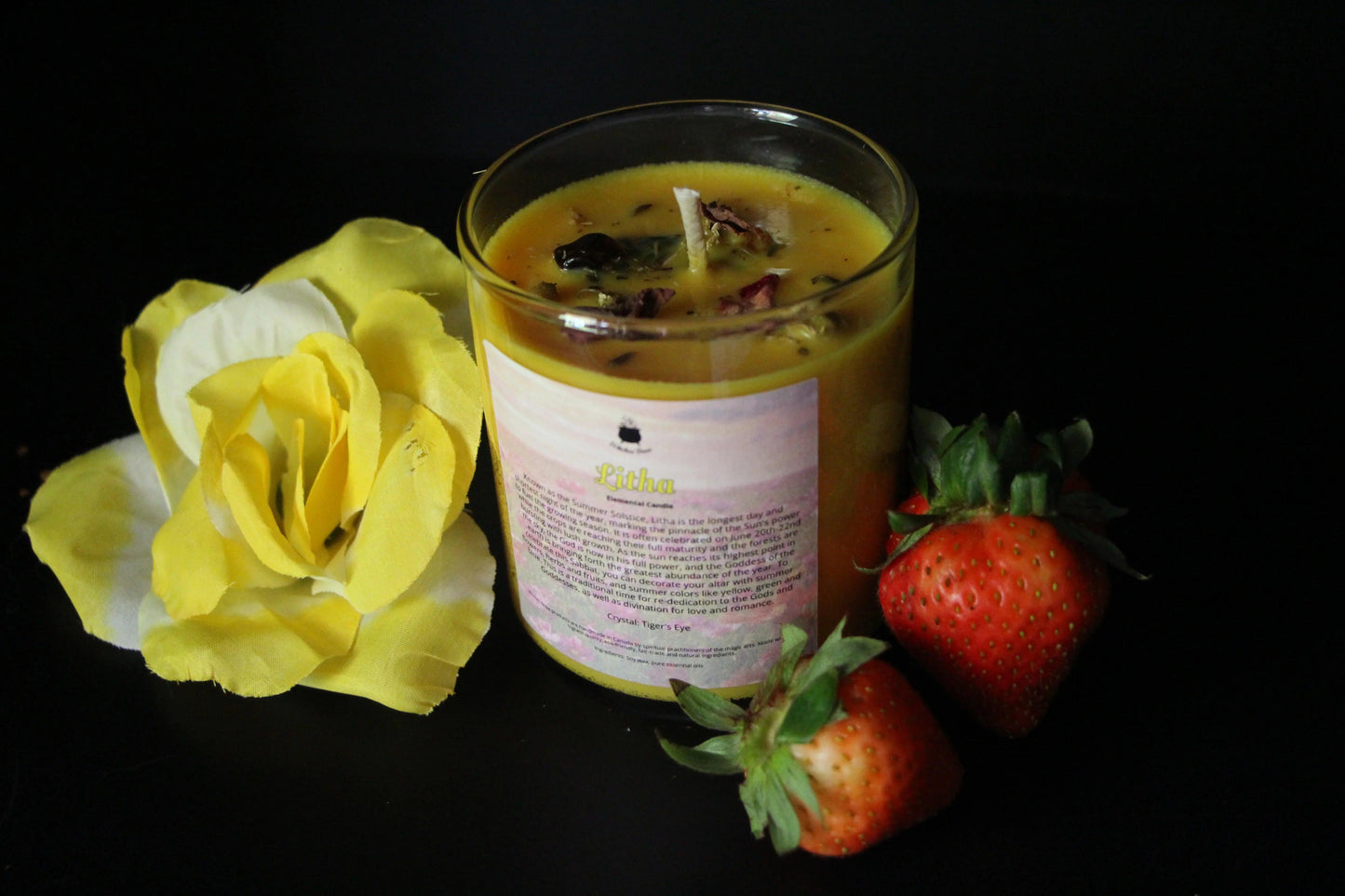 Hand-crafted yellow Litha crystal candle with flower and strawberries, Witches' Brew ritual decor