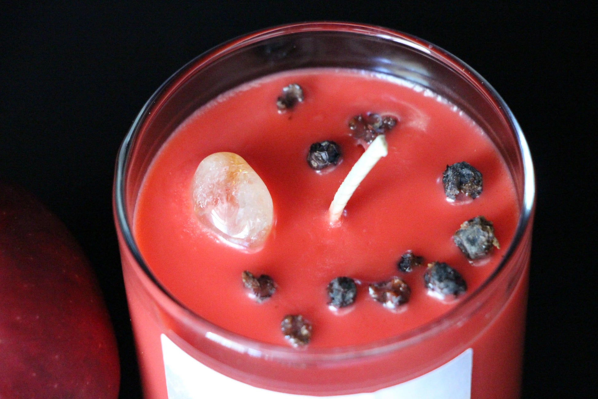 Red crystal candle with crystal and herbs in glass jar, Witches' Brew hand-crafted decor