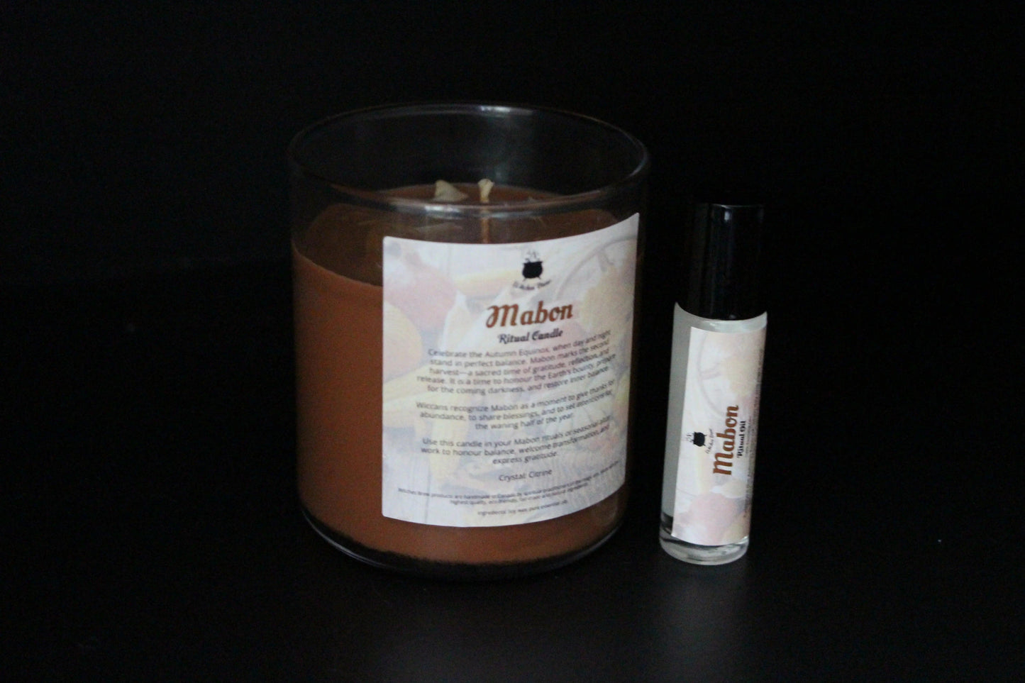 Mabon ritual candle and essential oil set for modern witches on black background