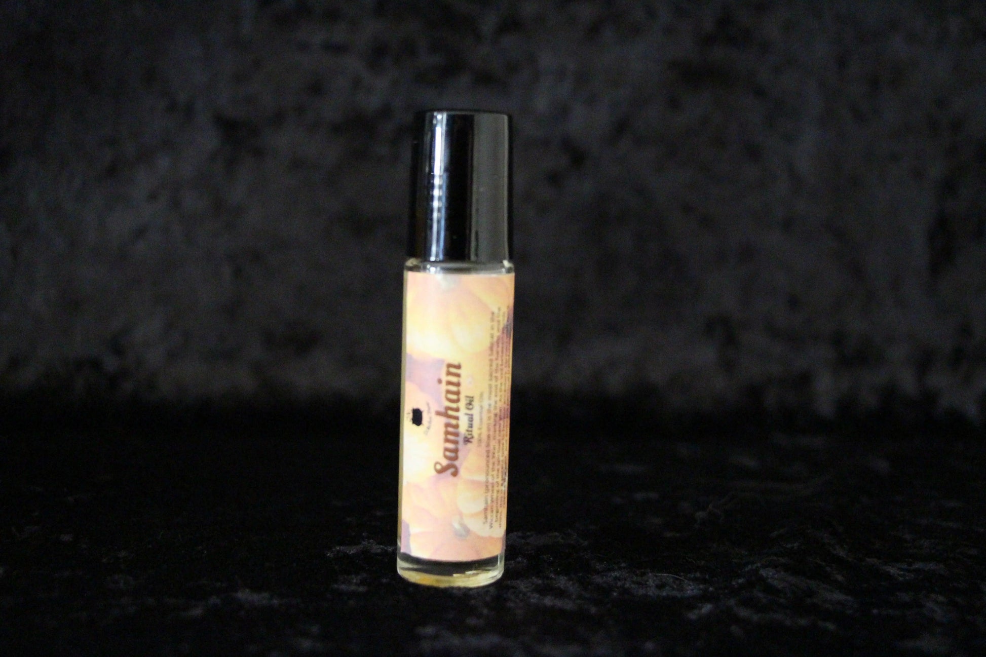 Samhain ritual oil bottle on black velvet, hand-crafted witchcraft essential oil