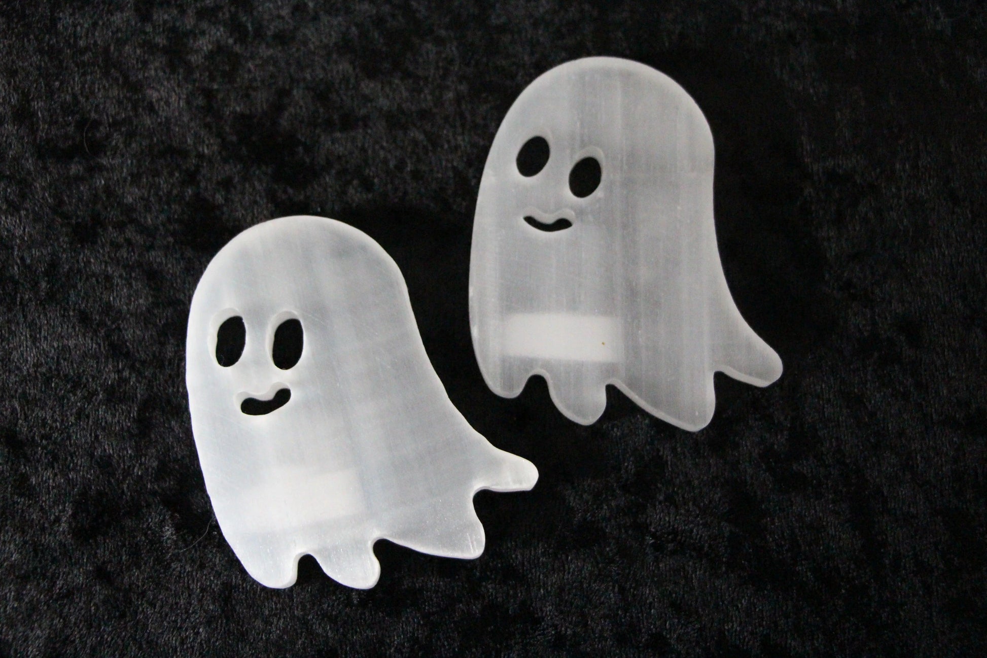 Two cute ghost-shaped acrylic pins on black velvet, handmade witchy accessories